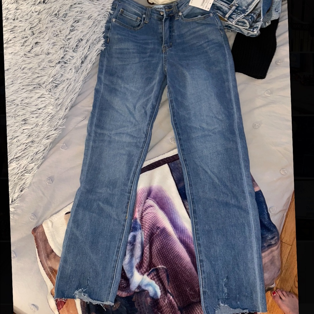 New jeans with distressed hem—never worn!